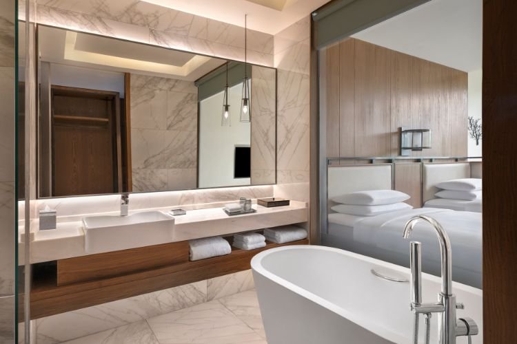 Deluxe Room bathroom at JW Marriott Jim Corbett Resort & Spa